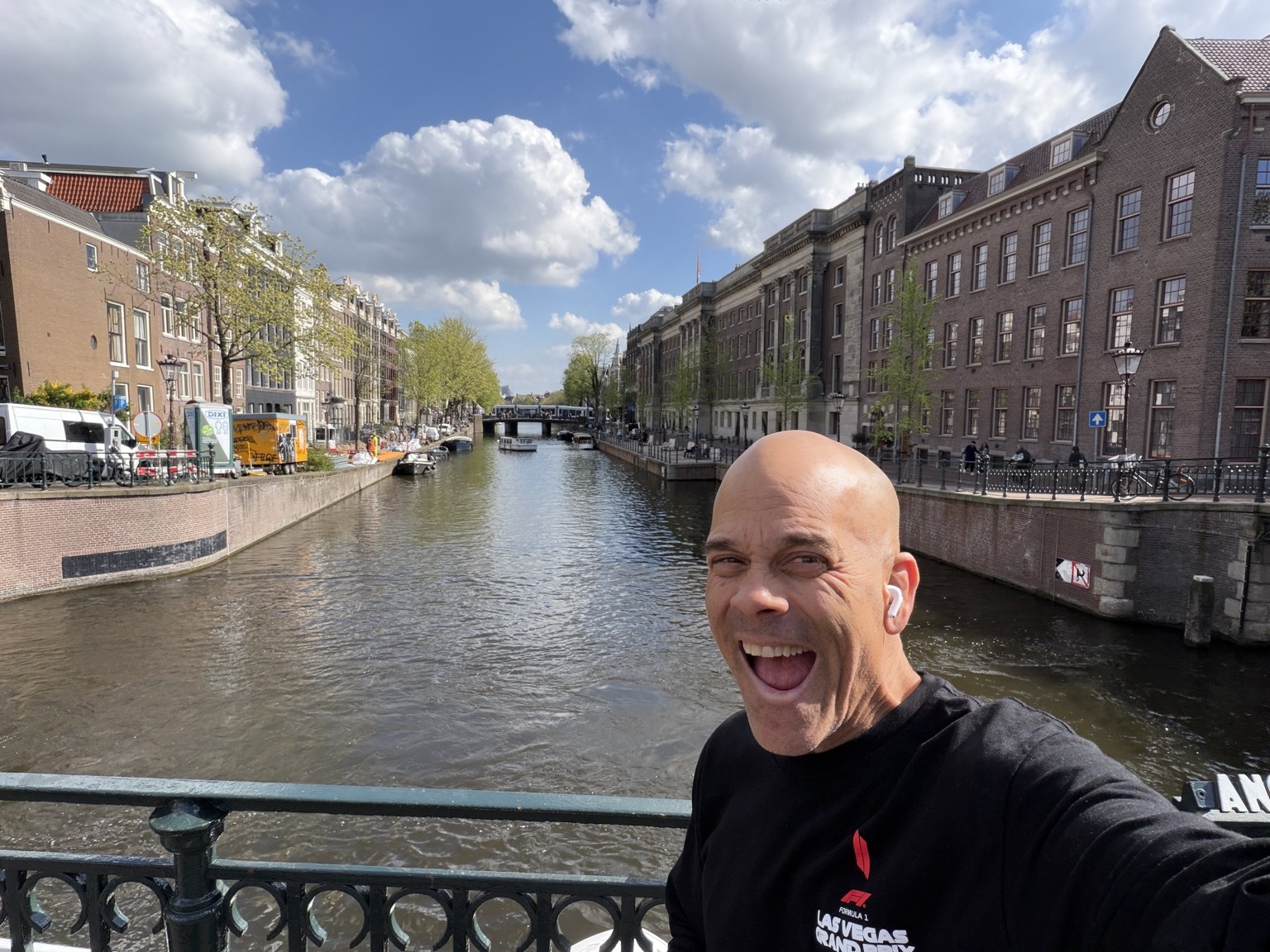 John enjoying a morning walk beside an Amsterdam canal